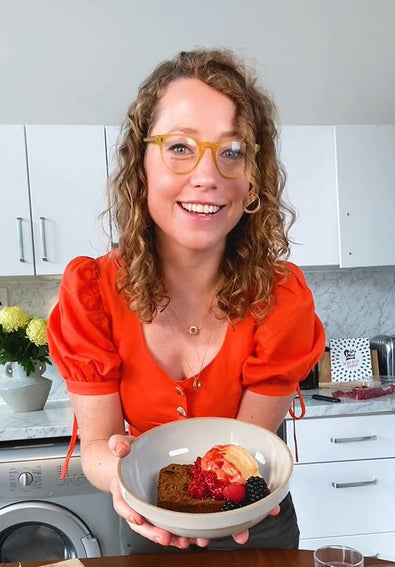 Pip holding bowl with banana bread 